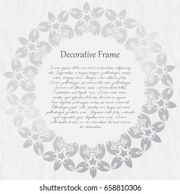 Vintage silver round frame on a textured background. Vector illustration.