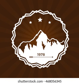 Vintage skiing resort or mountain patrol label, emblem or logo with mountain and cross