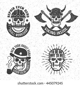 Vintage skull emblems with letterpress or rubber stamp effect. Background on separate layer. Vector illustration.