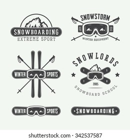 Vintage snowboarding or winter sports logos, badges, emblems and design elements. Vector illustration