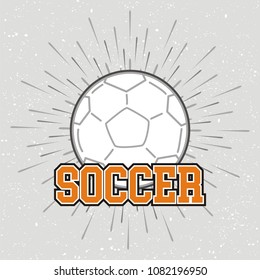 Vintage soccer with sunburst on grunge background