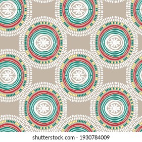 la primavera vintage de un círculo marrón típico salpicado con ornamento folclórico geométrico tribal. Textura étnica tribal patrón primavera brillante en un fondo beige oscuro, indio, escandinavo,