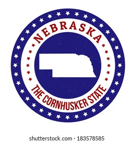 Vintage stamp with text The Cornhusker State written inside and map of Nebraska, vector illustration