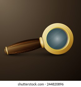 Vintage still life. Vintage magnifying glass lies on an ancient world map