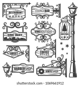 Vintage street lanterns labels set with metal pole inscriptions on wooden signboards and planks isolated vector illustration