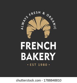 Vintage style bakery shop simple label, badge, emblem, logo template. Graphic food art with engraved croissant design vector element with typography. Linear organic pastry on black background.