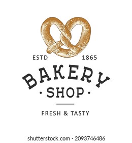 Vintage style bakery shop simple label, badge, emblem, logo template. Graphic food art with engraved pretzel design vector element with typography. Hand drawn organic bagel on white background.