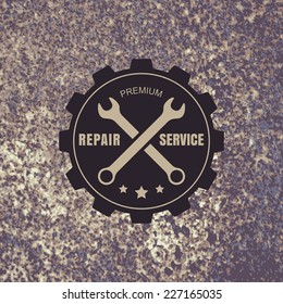 Vintage style car repair service label on rusty background. Vector logo design template. Concept for spare parts store.
