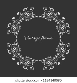 Vintage style empty round  silver frame on dark backdrop. Template for invitation, anniversary, greeting card.