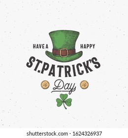 Vintage Style Saint Patricks Day Logo or Label Template. Hand Drawn Leprechauns Hat, Gold Coins and Shamrock Leaf Sketch Symbols with Retro Typography. Shabby Texture Background. Isolated.