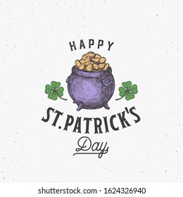 Vintage Style Saint Patricks Day Logo or Label Template. Hand Drawn Leprechauns Pot with Gold Coins and Shamrock Leaves Sketch Symbols with Retro Typography. Shabby Texture Background. Isolated.