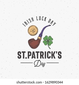 Vintage Style Saint Patricks Day Logo or Label Template. Hand Drawn Lucky Smoking Pipe, Gold Coin and Shamrock Leaf Sketch Symbols with Retro Typography. Shabby Texture Background. Isolated.