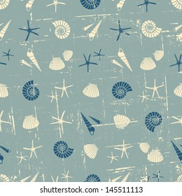 Vintage style seamless pattern with seashells in blue and white.