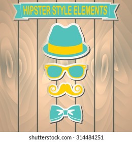 Vintage style silhouette of hat, mustaches, glasses and a bow tie.