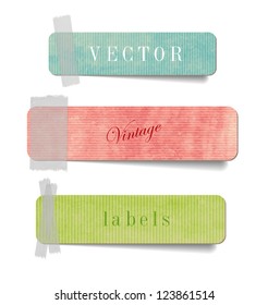 Vintage style textured colored paper cardboard labels with sticky tape