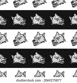 vintage style wolf head seamless pattern on black background