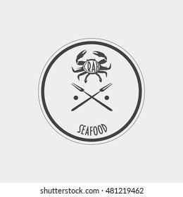 Vintage styled label with crab and two crab forks could be used as seafood shop sign, restaurant menu design element, pub sign or pub logo template, etc.