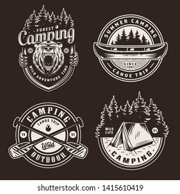 Vintage summer outdoor recreation emblems with ferocious bear head canoe boat forest crossed paddles tent on dark background isolated vector illustration