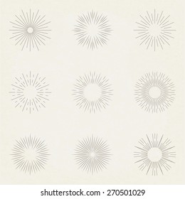 Vintage  sunbursts on grunge background. Decorative elements. Vector set.