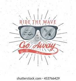 Vintage Surfing Graphics and Poster for web design or print. Surfer glasses emblem summer beach logo design and typography sign - ride the wave or go away. Surf Badge. Surfboard seal, element. Vector.