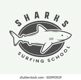 Vintage surfing logo, emblem, badge, label, mark. International surfing day card. Graphic art. Vector Illustration. Graphic Art.

