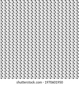Vintage textile pattern consisting of cross stitches and dots. Decorative graphics in black and white.