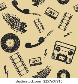 Vintage texture. Retro seamless pattern. Grunge texture. Images of cassette, disk, camera, film, phone. Retro symbols. Retro wallpaper. Vintage background.
