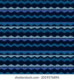 Vintage tie dye indigo zigzag seamless pattern.  Retro linear surface backdrop for prints, fabric, textile, wallpaper and wrapping paper. Vector illustration. Pattern design added to swatch panel.