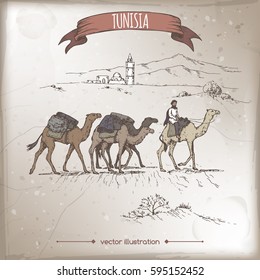 Vintage travel illustration with desert, camels and old mosque, Tunisia. Hand drawn sketch. Great for coffee, restaurant, cafe ads, travel brochures, labels.