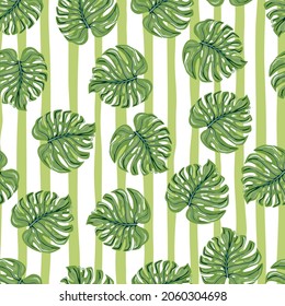 Vintage tropical seamless pattern with monstera leaves on stripe background. Botanical foliage plants wallpaper. Exotic hawaiian backdrop. Design for fabric, textile print, wrapping, cover