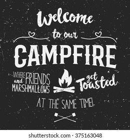 Vintage typography poster Illustration with sign welcome to campfire - Grunge effect. Funny lettering with symbol camp and trip, bonfire. On dark background for posters, camp clubs and Web emblems