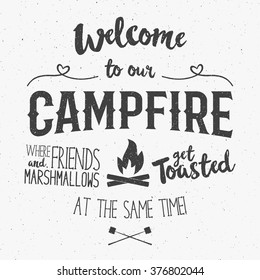 Vintage typography poster Illustration with sign welcome to campfire - Grunge effect. Funny lettering with symbols camp and trip, bonfire. On dark background for posters, camp clubs and Web emblems