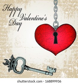 Vintage valentine card with hand-written heart and key