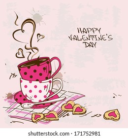 Vintage Valentine's greeting card with pair of teacups and cookies