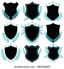 Vintage vector badges and shield shapes with blue laurel wreaths and foliage. Creative vector illustration. 