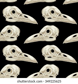 Vintage vector pattern with skulls raven on a black background.