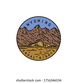 Vintage vector round label. Wyoming. Rocky Mountains