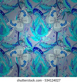 Vintage vector seamless pattern with a bouquet of flowers and butterflies in blue. Vector.