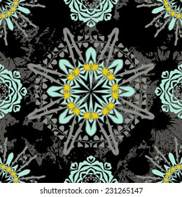 Vintage vector seamless pattern with flowers and blots. Floral mandala ornament.