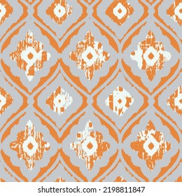 Vintage vector seamless pattern in ikat style. Retro orange grey white  colorful pattern with peacock feathers.