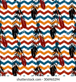 Vintage vector zig-zag background with tribal feathers