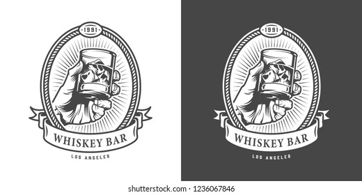 Vintage whiskey bar monochrome emblem with hand holding glass of whisky isolated vector illustration