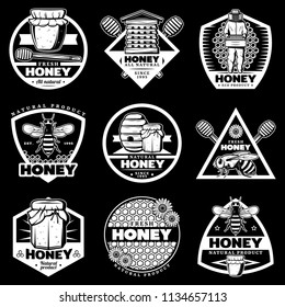 Vintage white honey emblems set with beehive beekeeper bee sticks honeycombs pots on black background isolated vector illustration