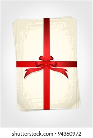 Vintage white paper records with red ribbon and bow