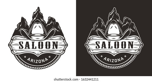 Vintage wild west monochrome emblem with cowboy hat saloon signboard on desert mountains landscape isolated vector illustration