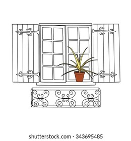 Vintage window with flower in pot.