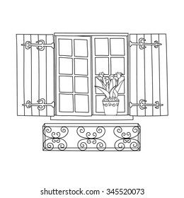 Vintage window with flower in pot.