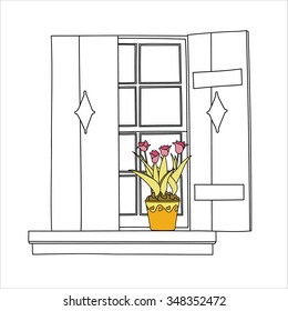 Vintage window with flowers in the pot.
