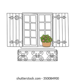 Vintage window with flowers in the pot.