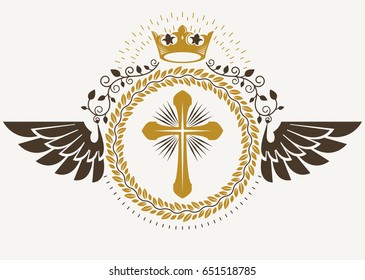 Vintage winged emblem created in vector heraldic design and composed using religious cross, and monarch crown.